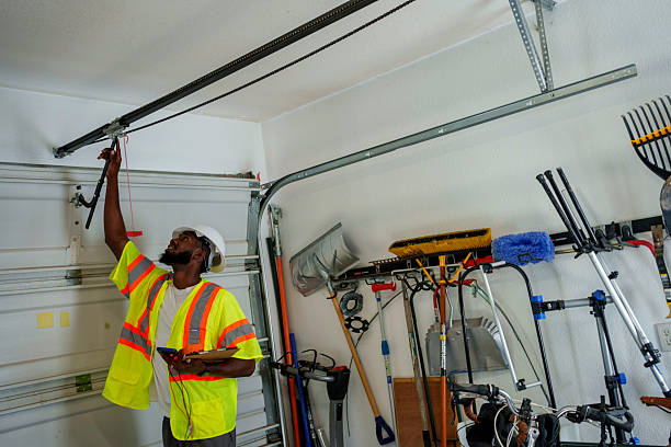 Professional Garage Door Panel Replacement technician working in North Windham, ME
